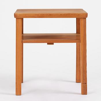 Axel Einar Hjorth, a stained pine "Värmdö" table, Nordiska Kompaniet, Sweden, 1930s.