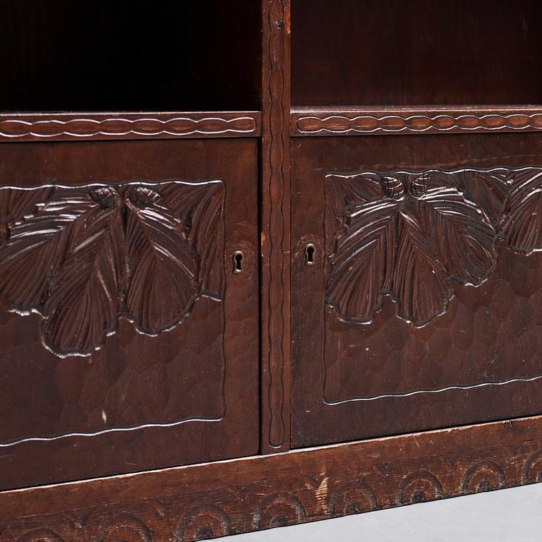 Otto Wretling, attributed to, an Art Nouveau carved pine book shelf, Umeå, Sweden, early 20th century.