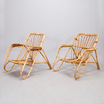 Lasse Ollinkari, a pair of mid-20th century 'Bunkku' wicker armchairs.