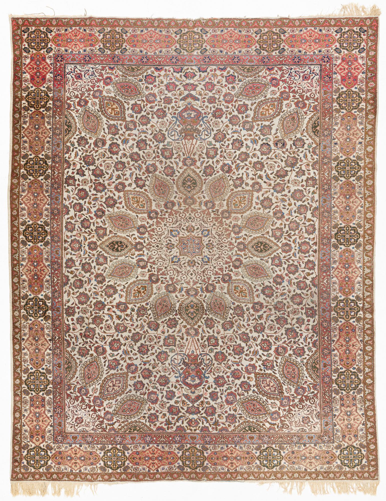 A Tabriz carpet, c. 390 x 305 cm.