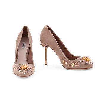 MIU MIU, a pair of beige suede pumps with sequined embellishment.