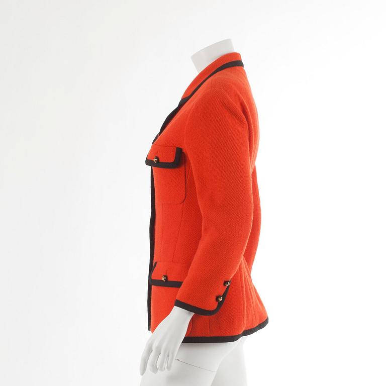 CHANEL, a orange wool jacket. French size 42.