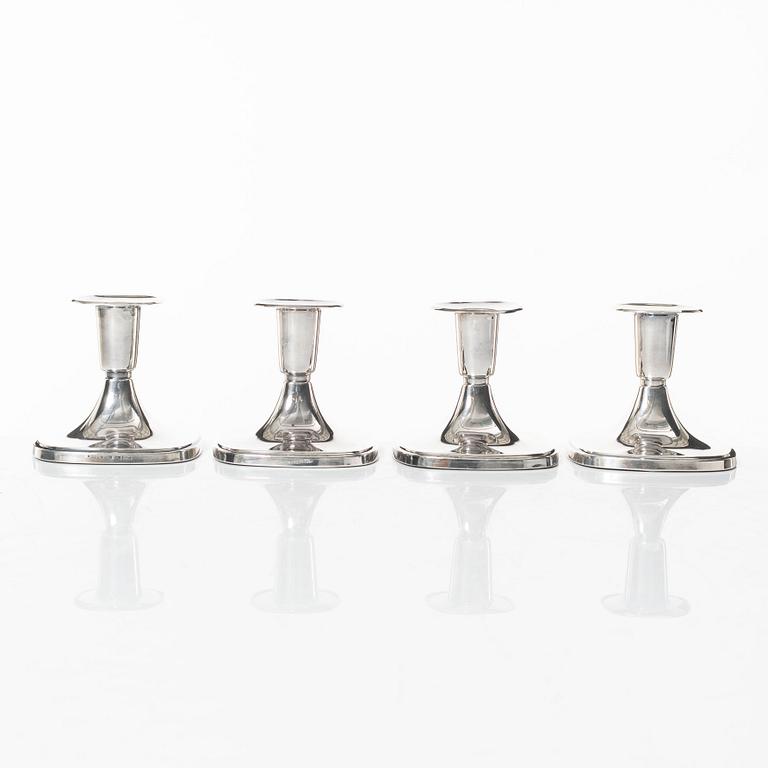 Tore Eldh, four silver candlesticks, K&EC/Ceson, Gothenburg, 1967-80.