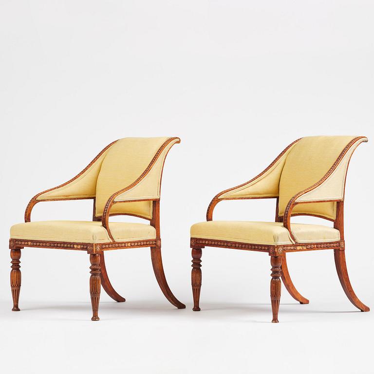 A pair of late gustavian armchairs in the manner of Ephraim Ståhl, Stockholm, circa 1800.