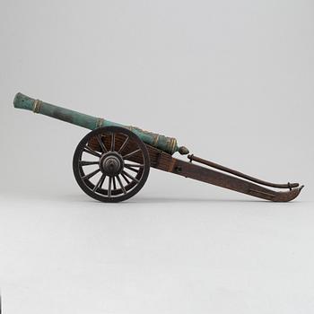 A copy of a field canon with monogram of king  Karl XII produced by Svensk Metallkonst, Carlscrona in late 20th century.