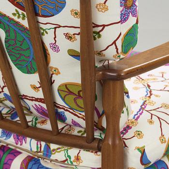 A pair of Josef Frank mahogany armchairs for Svenskt Tenn, model 891.