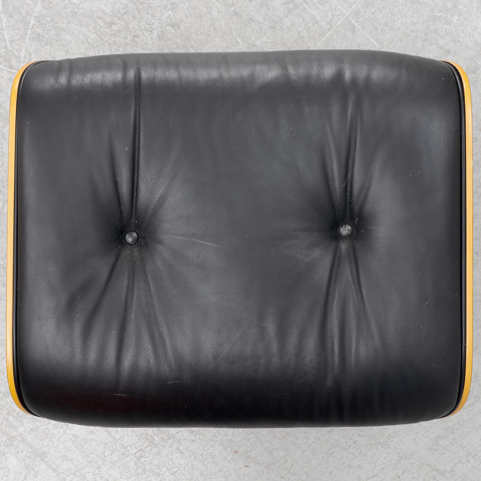 Charles & Ray Eames, an 'Eames Lounge Chair' with ottoman, Vitra.