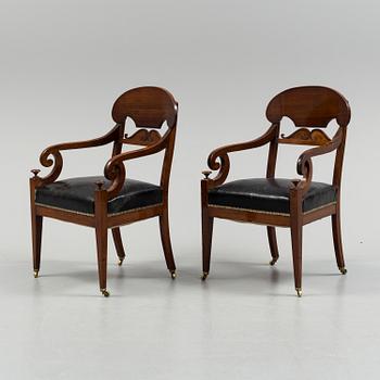 A pair of early 19th century mahogany  Empire armchairs, presumably from the Baltic countries.