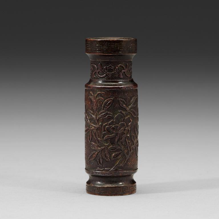 A cylindrical patinated bronze vase with silver inlay, Qing dynasty, 18th century.