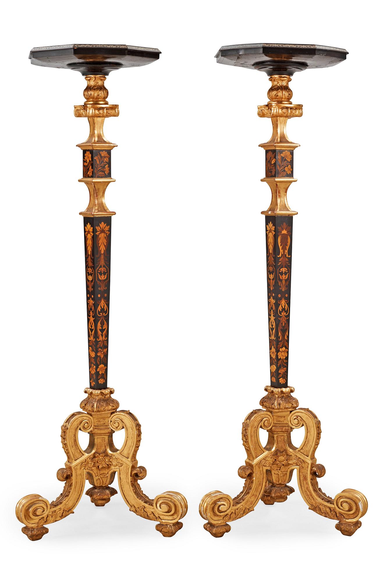 A pair of French Baroque circa 1700 candle stands.