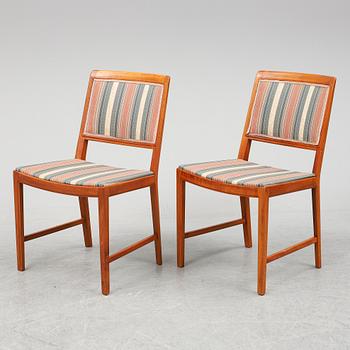 BERTIL FRIDHAGEN, a seven  piece walnut dining suite from Bodafors.