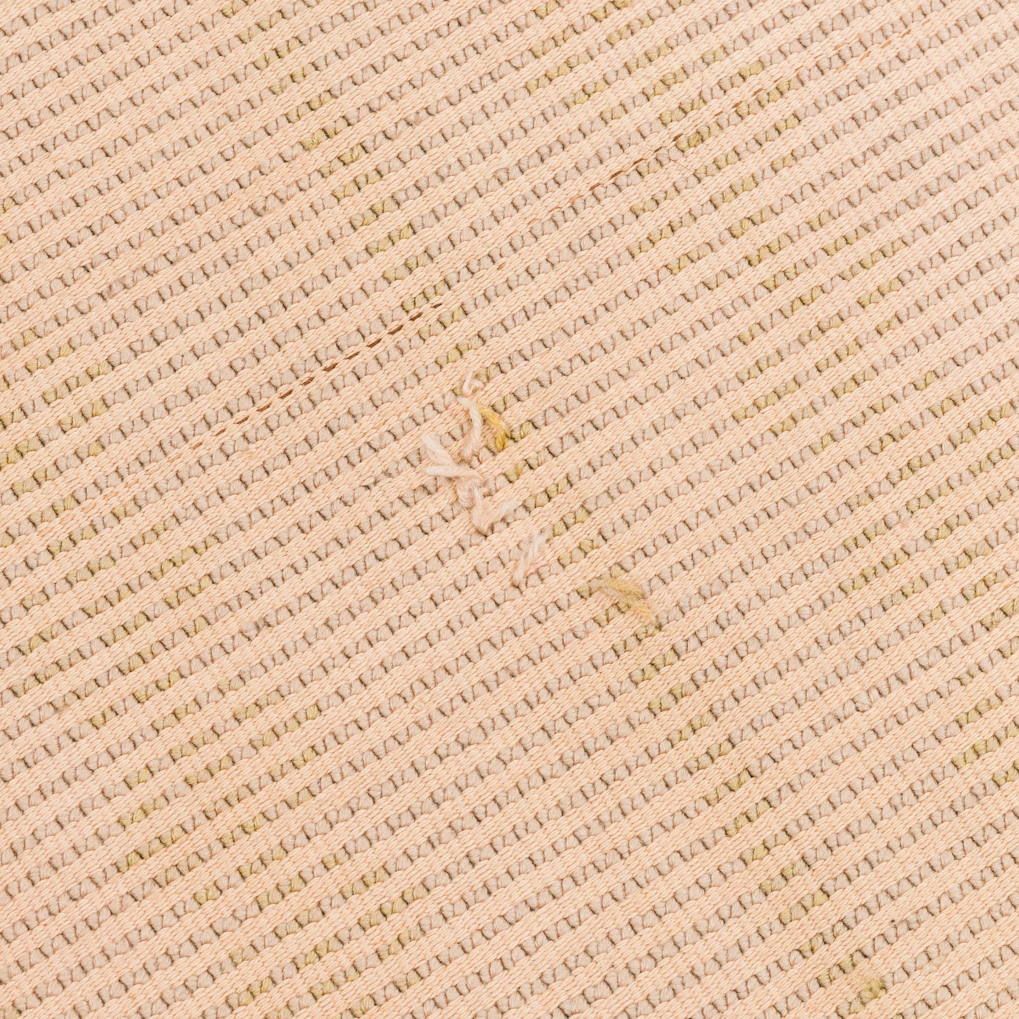 Akseli Gallen-Kallela, a Finnish bench rug manufactured by Friends of Finnish Handicraft 1899.