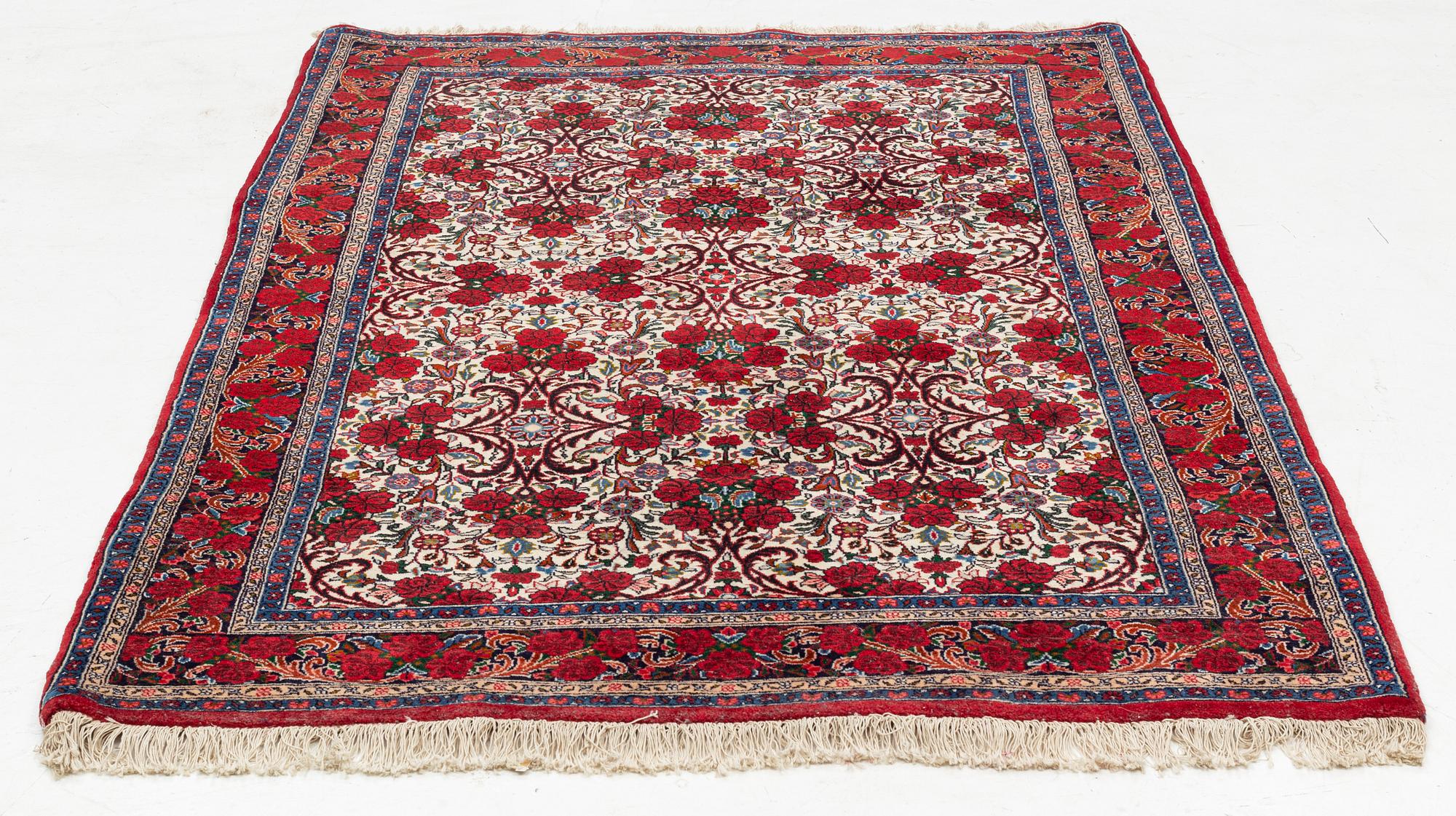 A rug, Ghom, circa 206 x 136 cm.