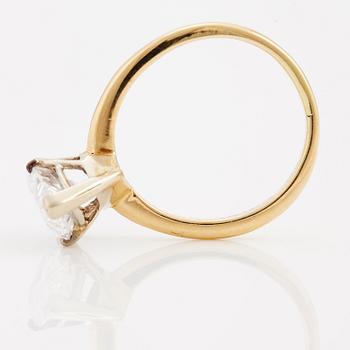A pear cut diamond ring.