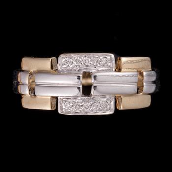 RING, 14K vitguld/gulguld, små diamanter tot. 0,06 ct. Stämplad med Stockmann logo. Vikt 3,9 g.