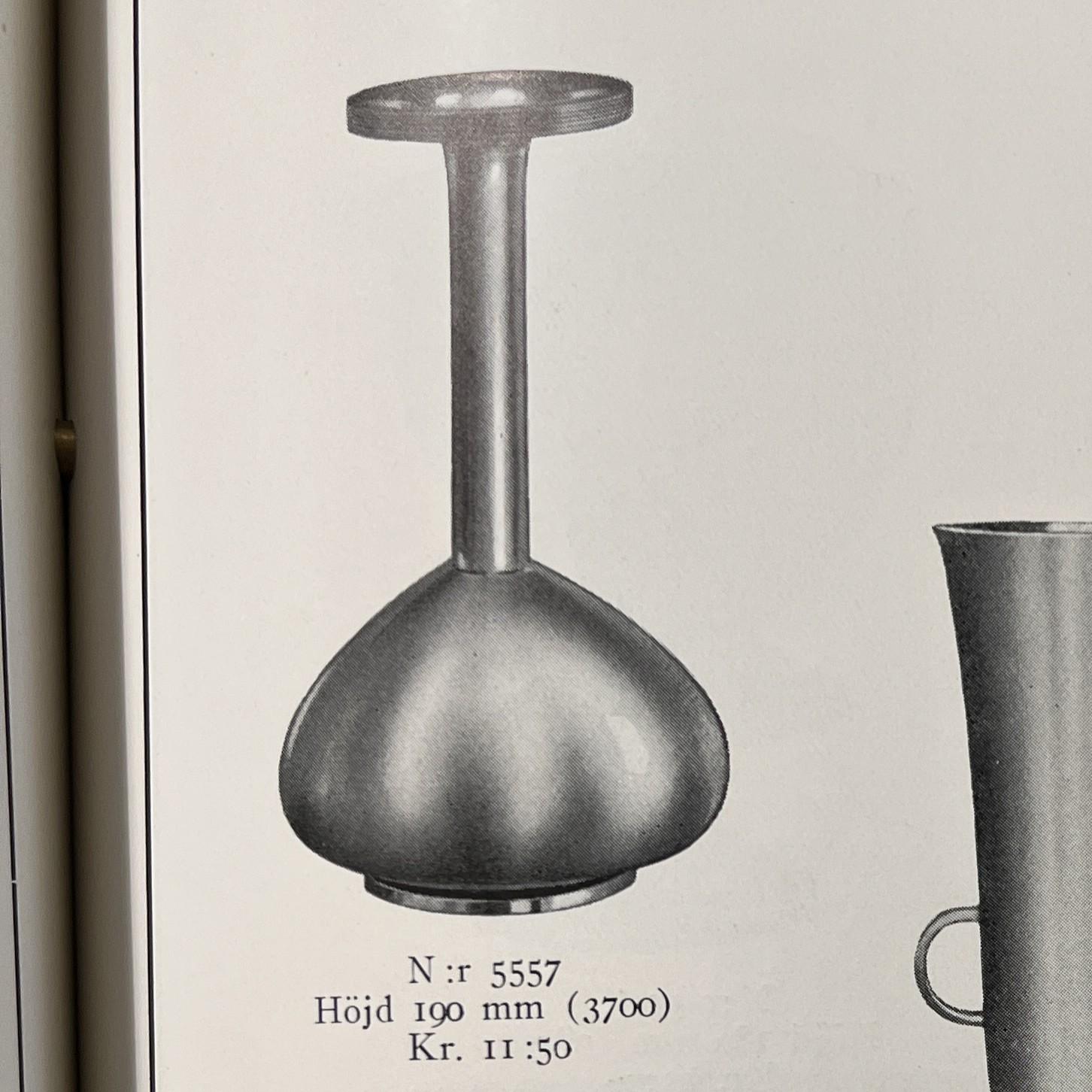 Sylvia Stave, a pewter and brass vase model 5557, C.G. Hallberg, Stockholm, 1933.