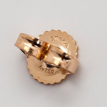 Tiffany & Co, örhängen, "Tiffany Solitaire", 18K guld och briljantslipade diamanter.