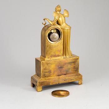 A French Empire mantel clock, beginning of the 19th ct.