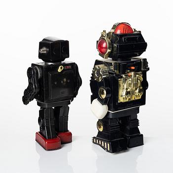 Two toy robots; Sonai 1985, Taiwan and Super Astronaut Horikawa, Japan 1963.