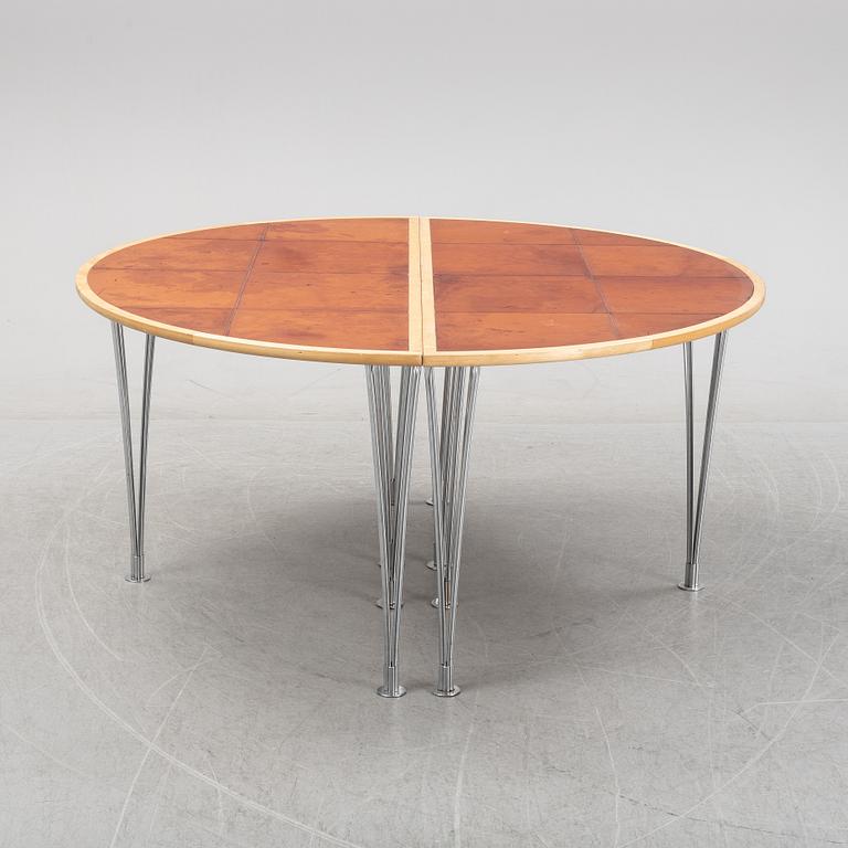 A birch and leather dining table in two parts, Mathsson International, 21th century.