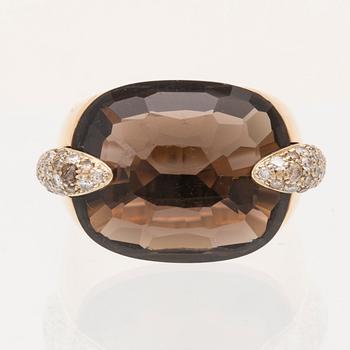 An 18K gold Pomellato "Pin Up" ring set with smoky quartz and round brilliant-cut diamonds.