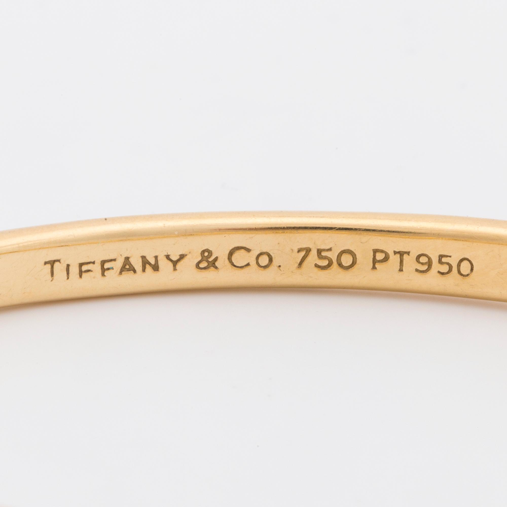 TIFFANY & Co, armring med briljantslipade diamanter ca 0.20 ct.