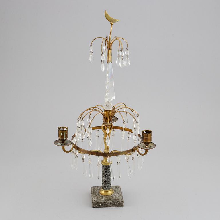 A gustavian style three-light girandole, first half of the 20th century.