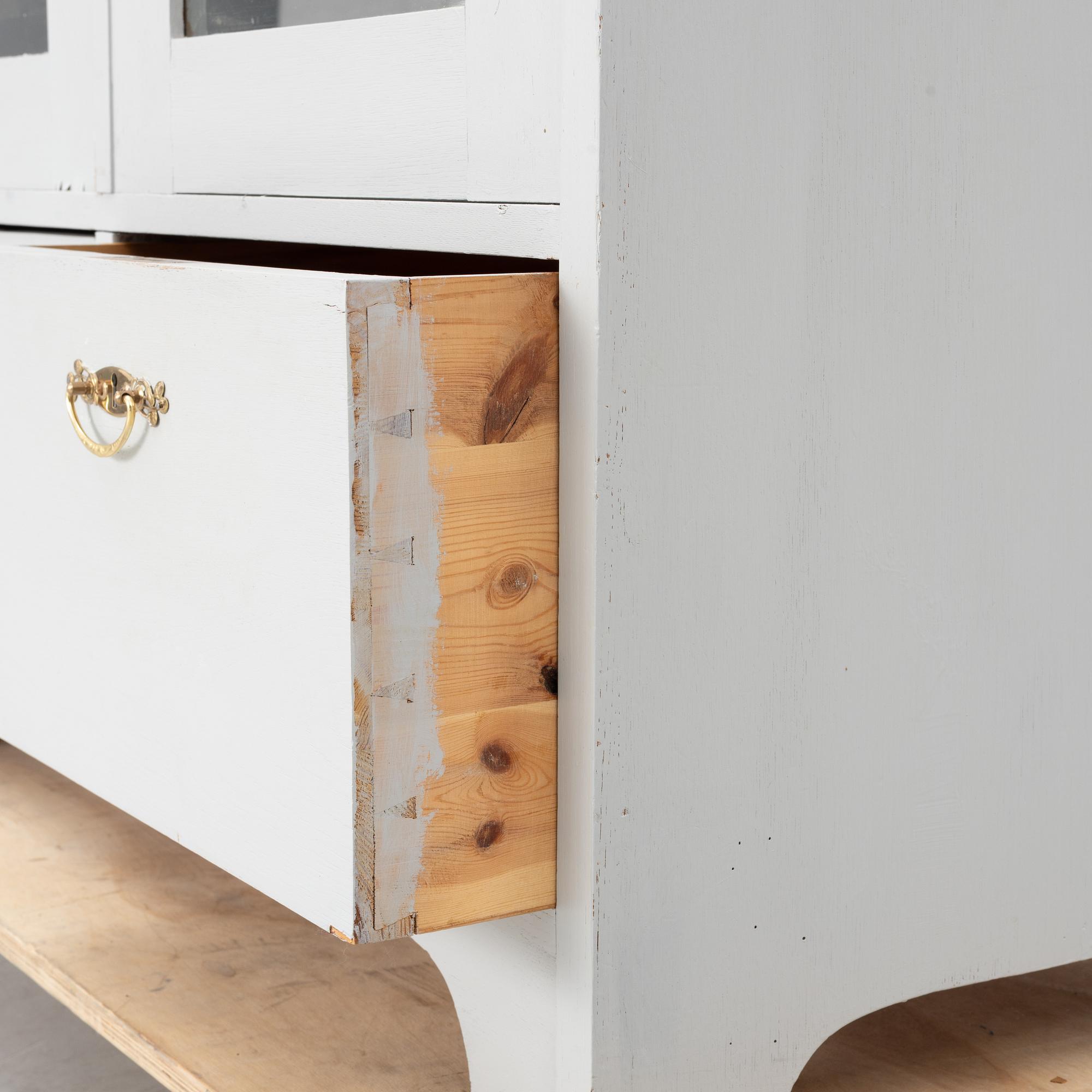 Display cabinet, early 20th century.