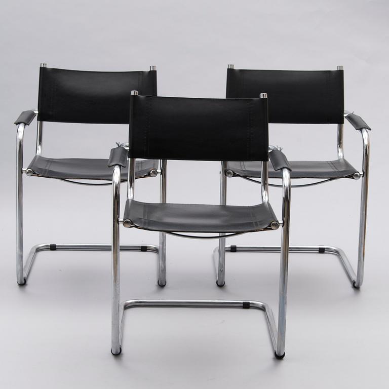 A Set of Three Chrome and Black Leather Chairs.