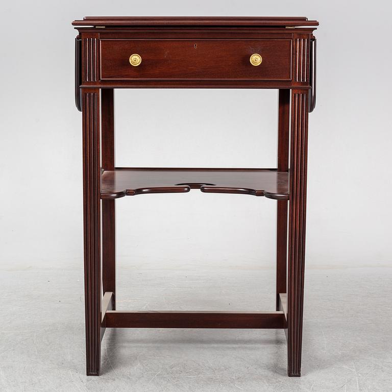 a mahogany writing desk from the second half of the 20th century.