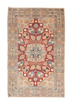 A rug, Old Nain, part silk, ca 257 x 165 cm.