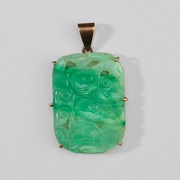34. A carved jadeite pendant with lingzhi mushrooms, early 20th Century.