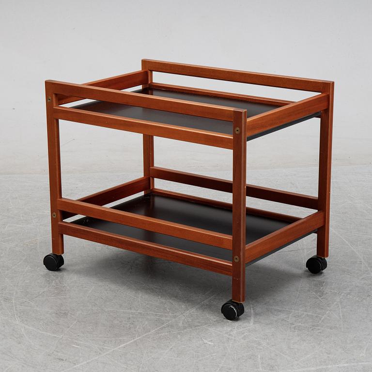 Børge Mogensen, a model '5370' teak and laminate trolley from Frederica Stolefabrik, Denmark.