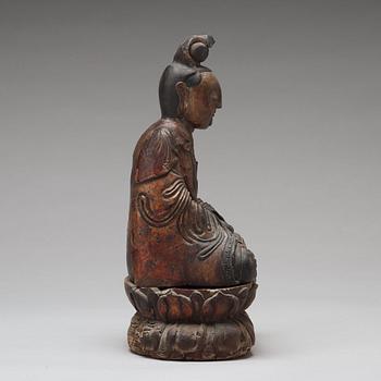 A lacquered and gilded wooden figure of Guanyin, Ming dynasty (1368-1664).