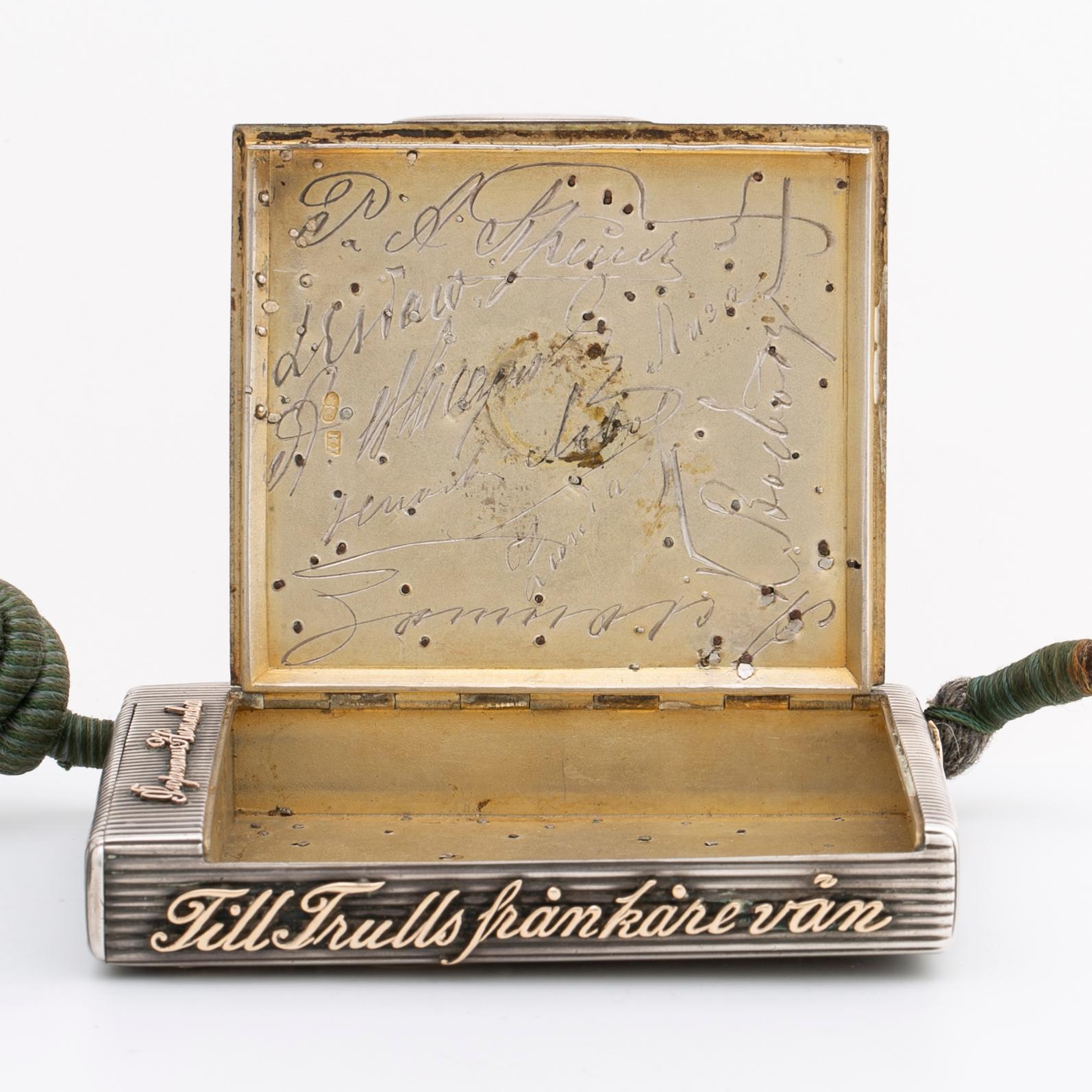 Silver box, gold, enamel, rose-cut diamonds, saphires and rubies (possibly synthetic), silk chord, St Petersburg.