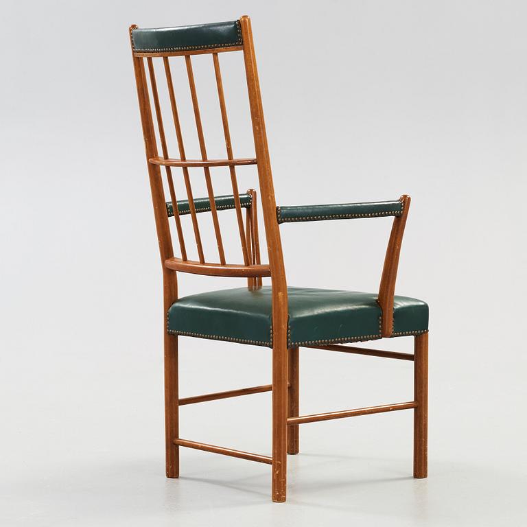 A Josef Frank mahogany and green leather armchair, Svenskt Tenn, model 652.