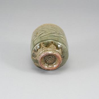 TATSUZŌ SHIMAOKA, a celadon glaze vase, signed.