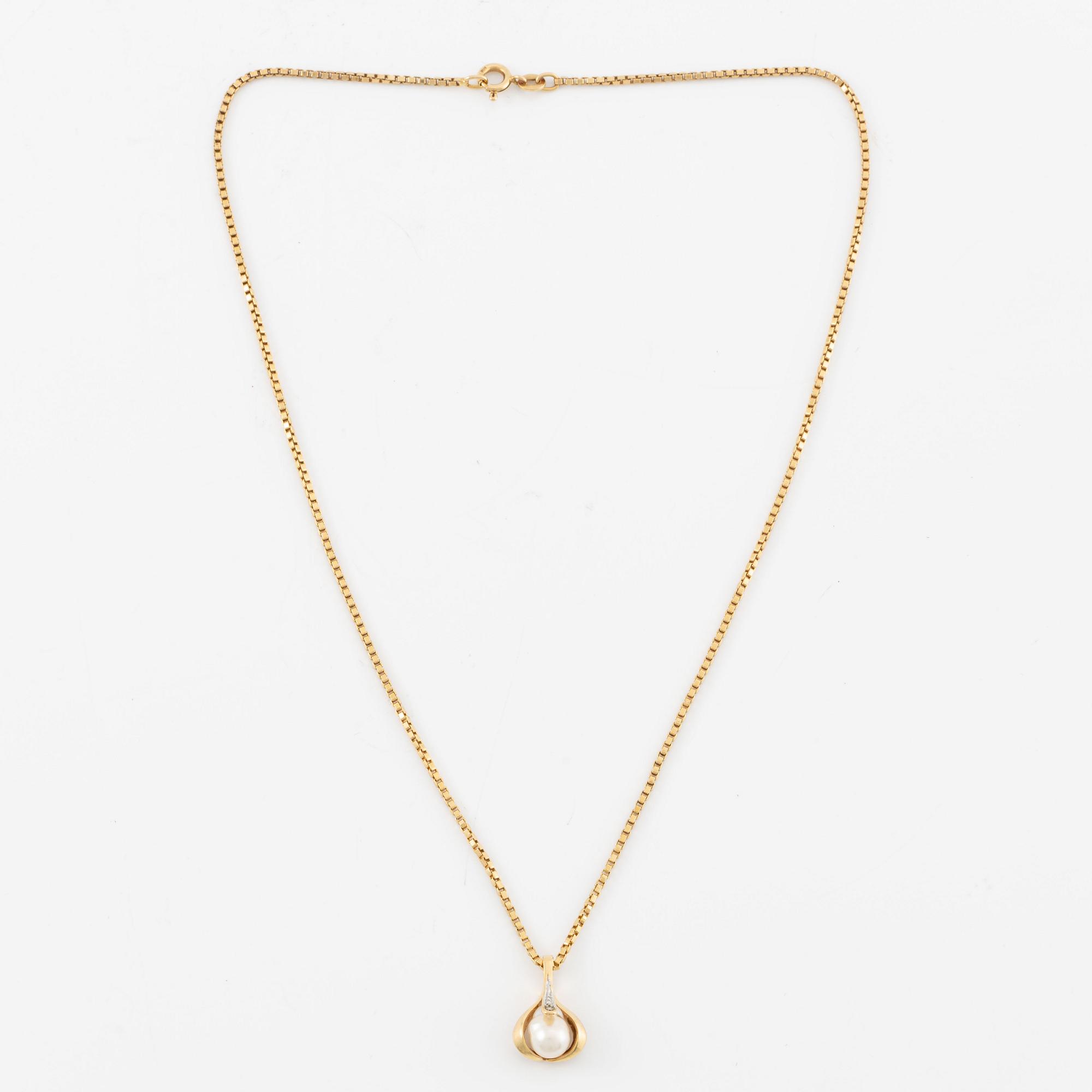 Hänge med kedja 18K guld med en odlad pärla och en diamant.