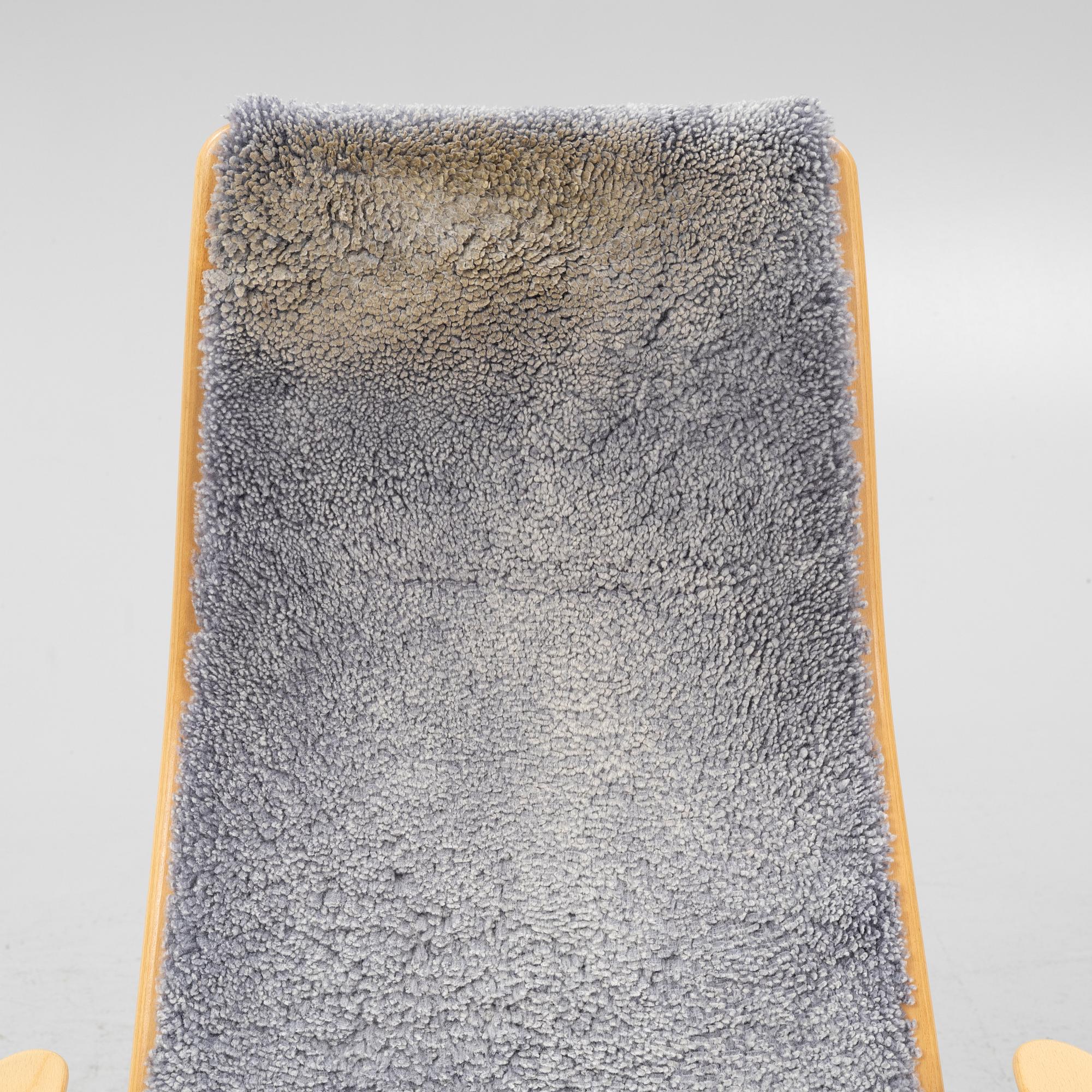 Yngve Ekström, A 'Lamino' easy chair with stool, Swedese, dated -07.