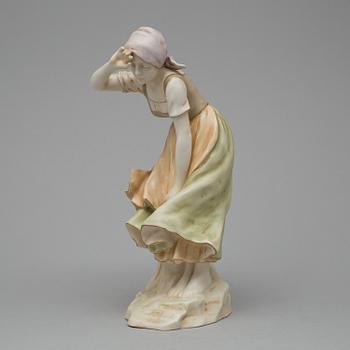 A figurine by Doebird, Wahliss, Royal Vienna, Austria.