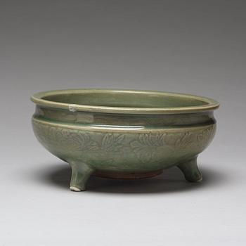 A celdonglazed tripod censer, Ming dynasty (1368-1644).