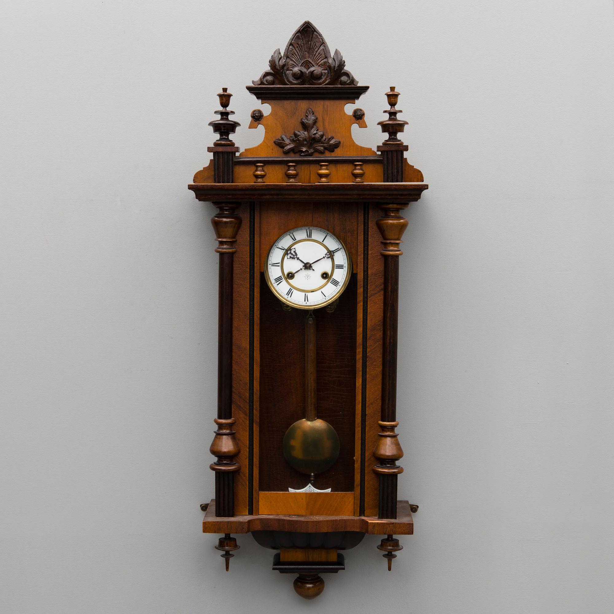 A neo renaissance German Junghans wall clock from around the turn of the 20th Century.