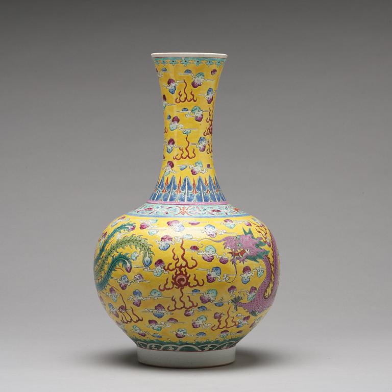 A yellow glazed dragon and phoenix vase, China, circa 1900.