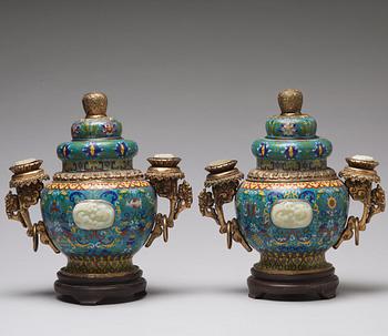 A pair of chinese cloisonne jars with covers with nephrite placques, 20th Century.