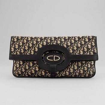 Christian Dior, a 'Oblique fold-over convertible clutch'.