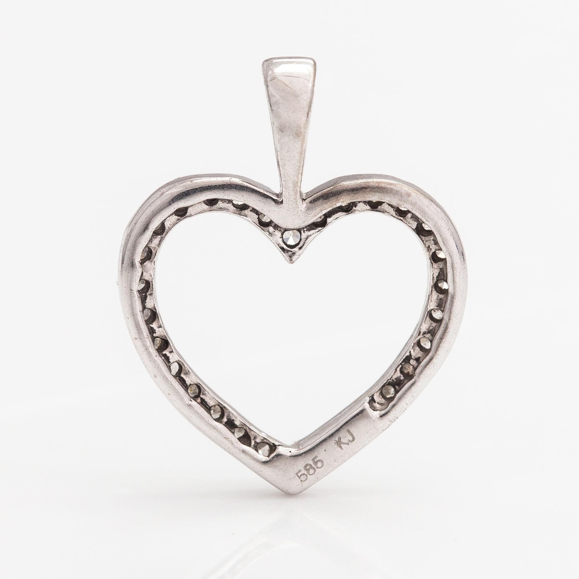 Riipus, 14K valkokultaa, timantteja n. 0.15 ct yht. Kultajousi, Helsinki.