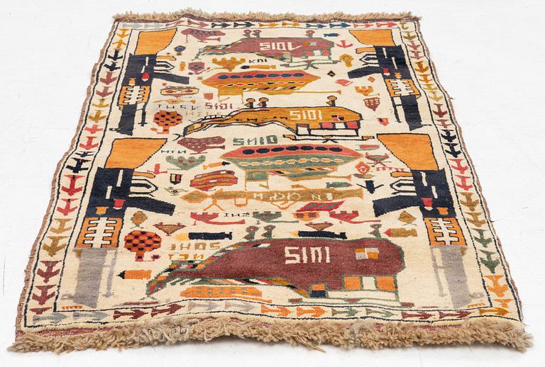 Carpet, oriental, known as War Rug, 1980s-90s. C. 154 x 95 cm.