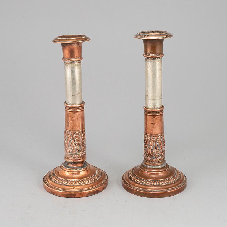 A pair of English early 19th century candlesticks.
