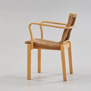 An Alvar Aalto armchair, made on license by Aalto Design, Hedemora for Artek, Sweden 1946-56.