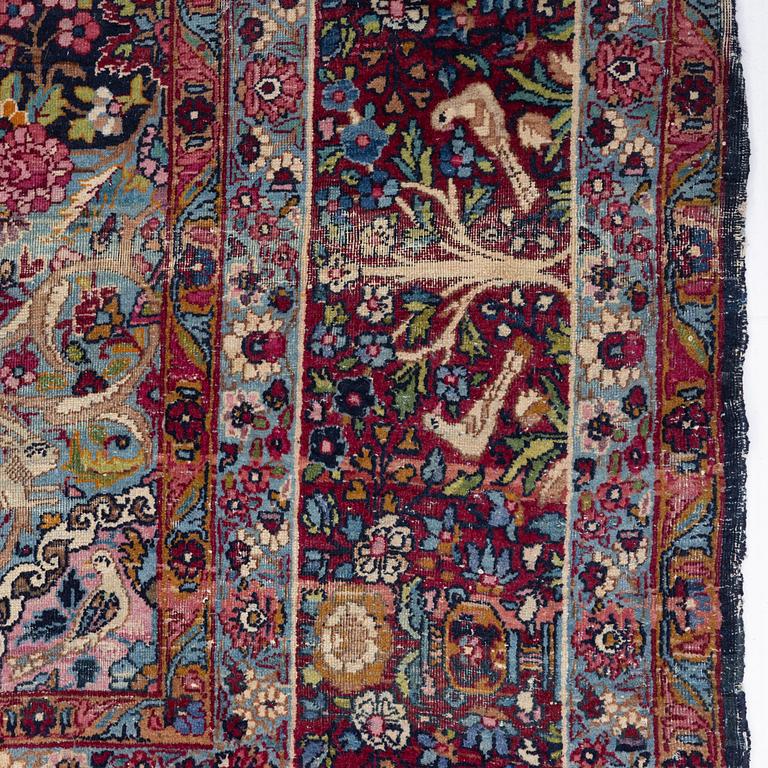A carpet, Antique/semi-antique Kerman, ca 340 x 220 cm.